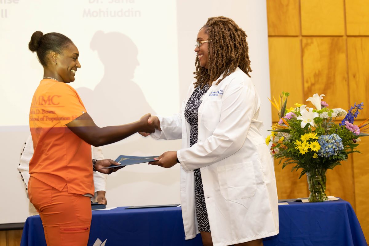 Student accepting an award at the 2023 Honors and Awards Ceremony